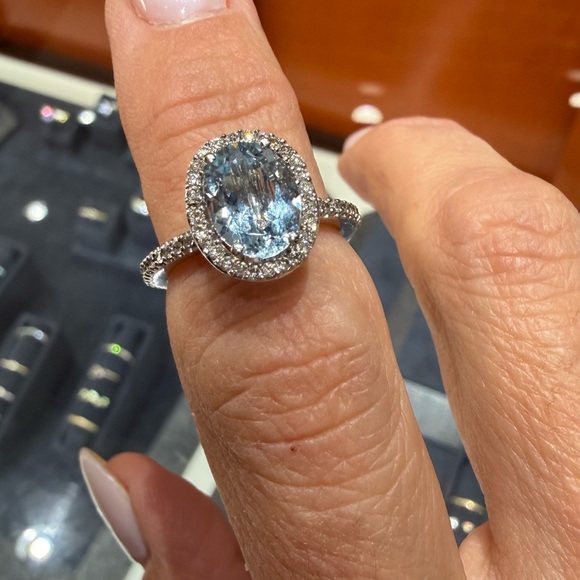 Jewelry - Gorgeous Oval Diamond Halo Ring with Aquamarine Gemstone.